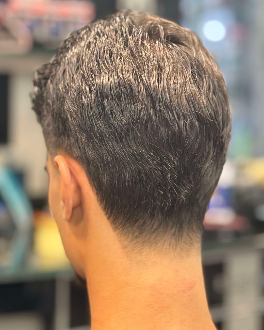 The same cut finished — a clean taper into the neckline