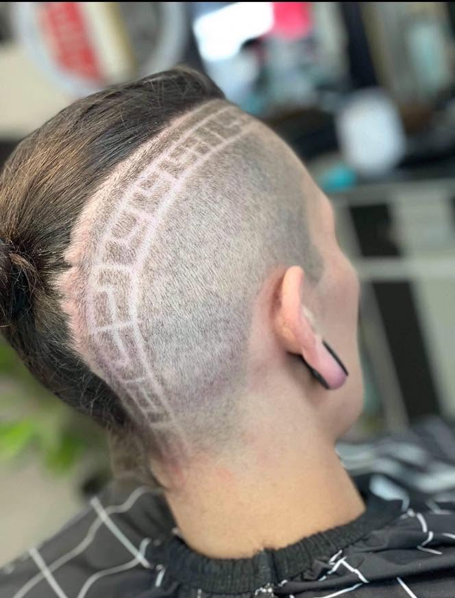 A geometric key pattern shaved into the side of a fade at Marmaris
